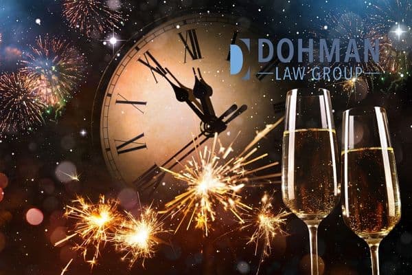 two glasses of champagne with fireworks and a clock in the background, after a DUI on New Year's